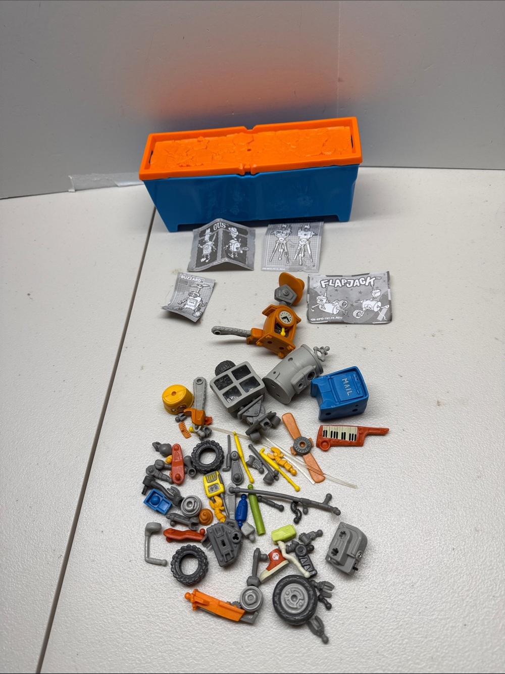 Flapjack Playset Accessory Bin with Orange Lid and Blue Base